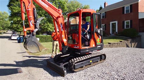 how to change the bucket on a kubota mini digger|mini digger bucket replacement instructions.